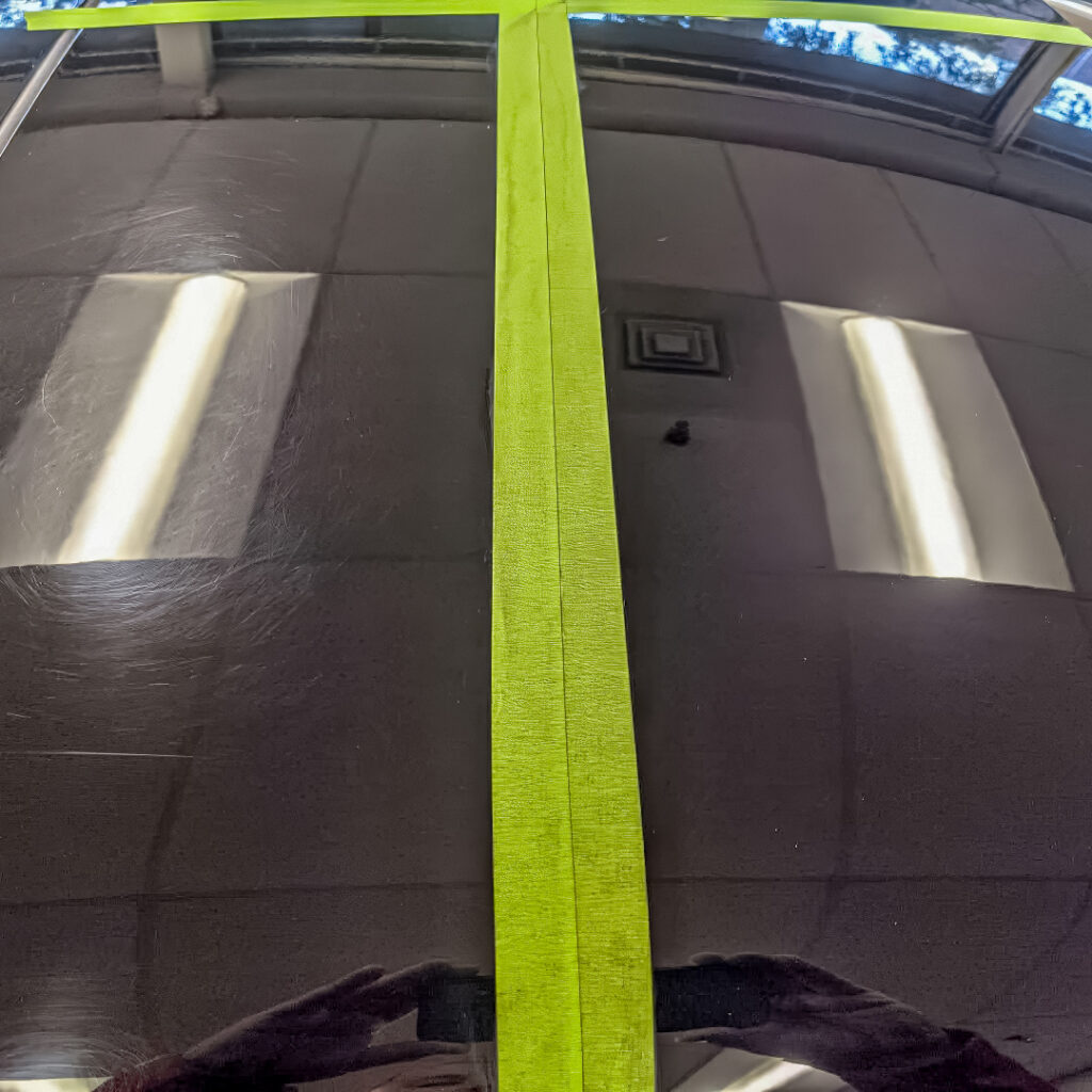 Comparison between paint corrected paint and scratched paint.